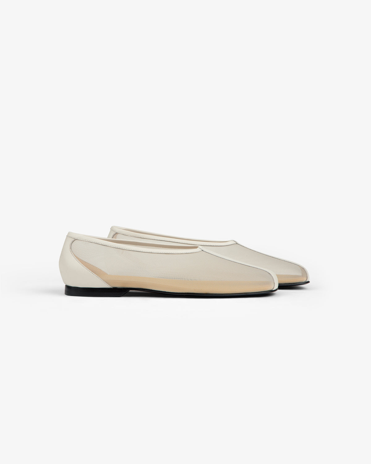 The Mesh Ballet Flat is a cream sheer slip-on with black soles, shown on a white background.