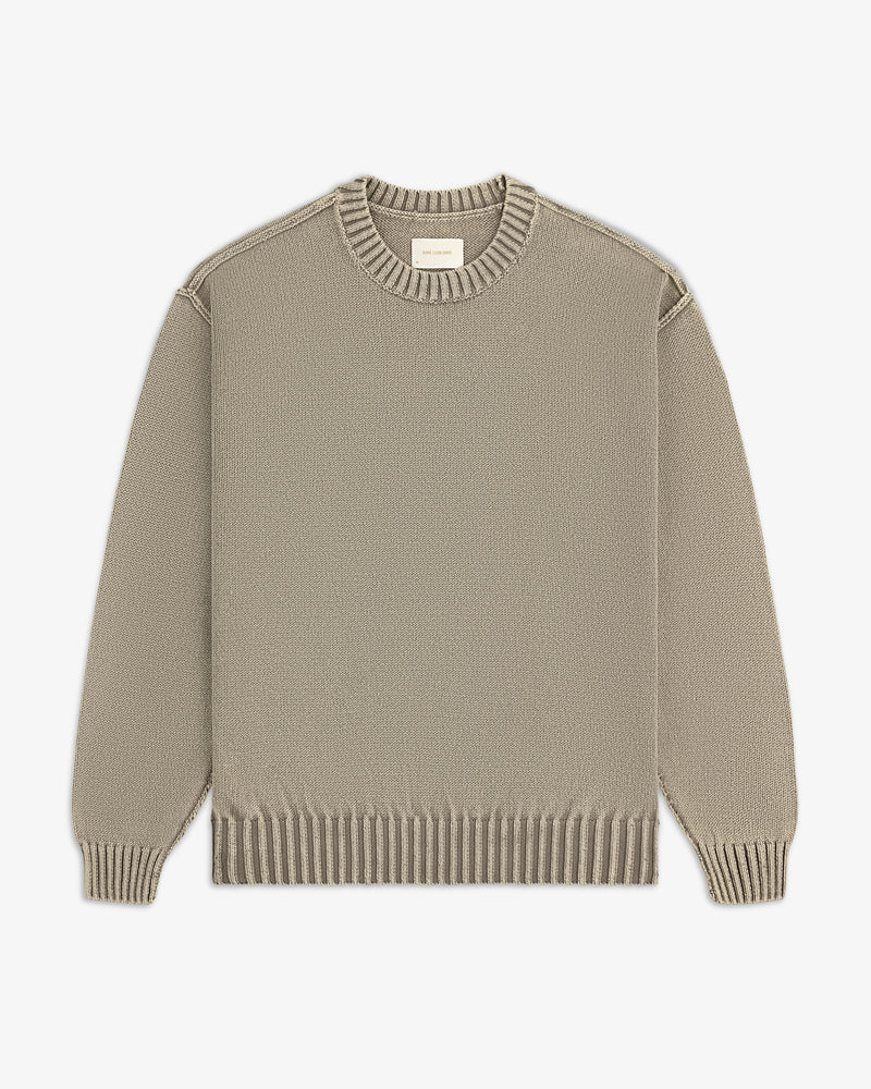 Washed Inside Out Sweater in beige, crewneck with ribbed cuffs, collar, and hem, shown flat on white background.