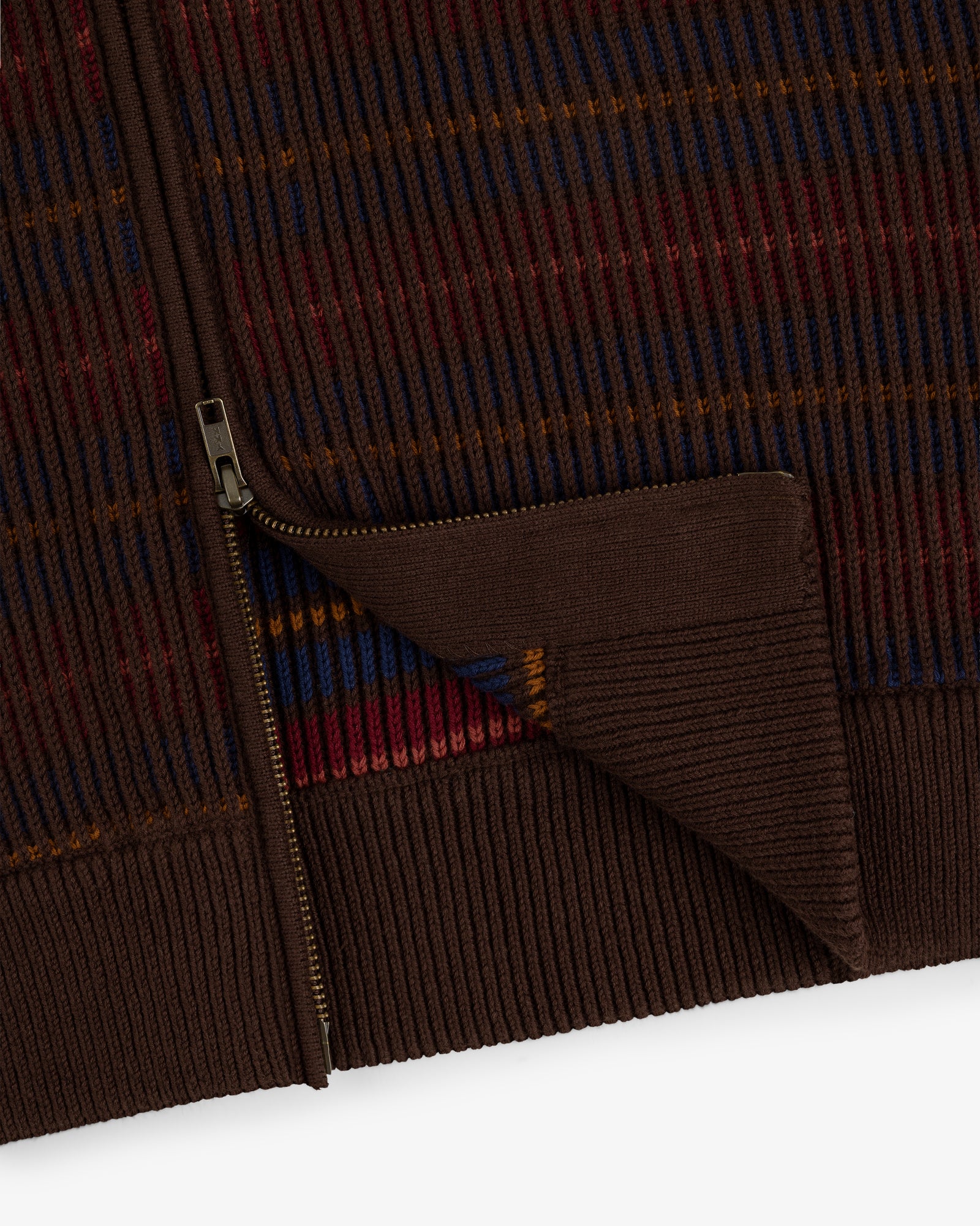Multi Color Knit Track Sweater with brown zip-up design, ribbed hem, and blue, red, orange, and yellow stripes.