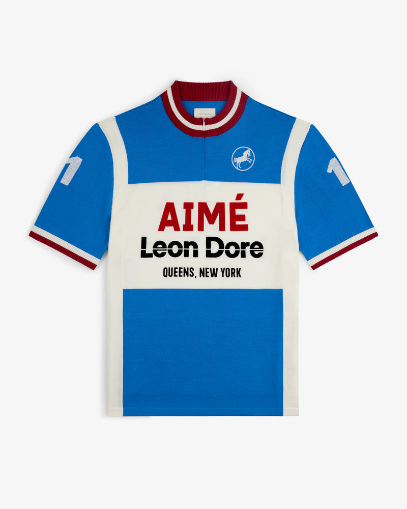 Blue and white Merino Wool Cycling Jersey with “AIMÉ Leon Dore QUEENS, NEW YORK” and number 11 on the sleeves.