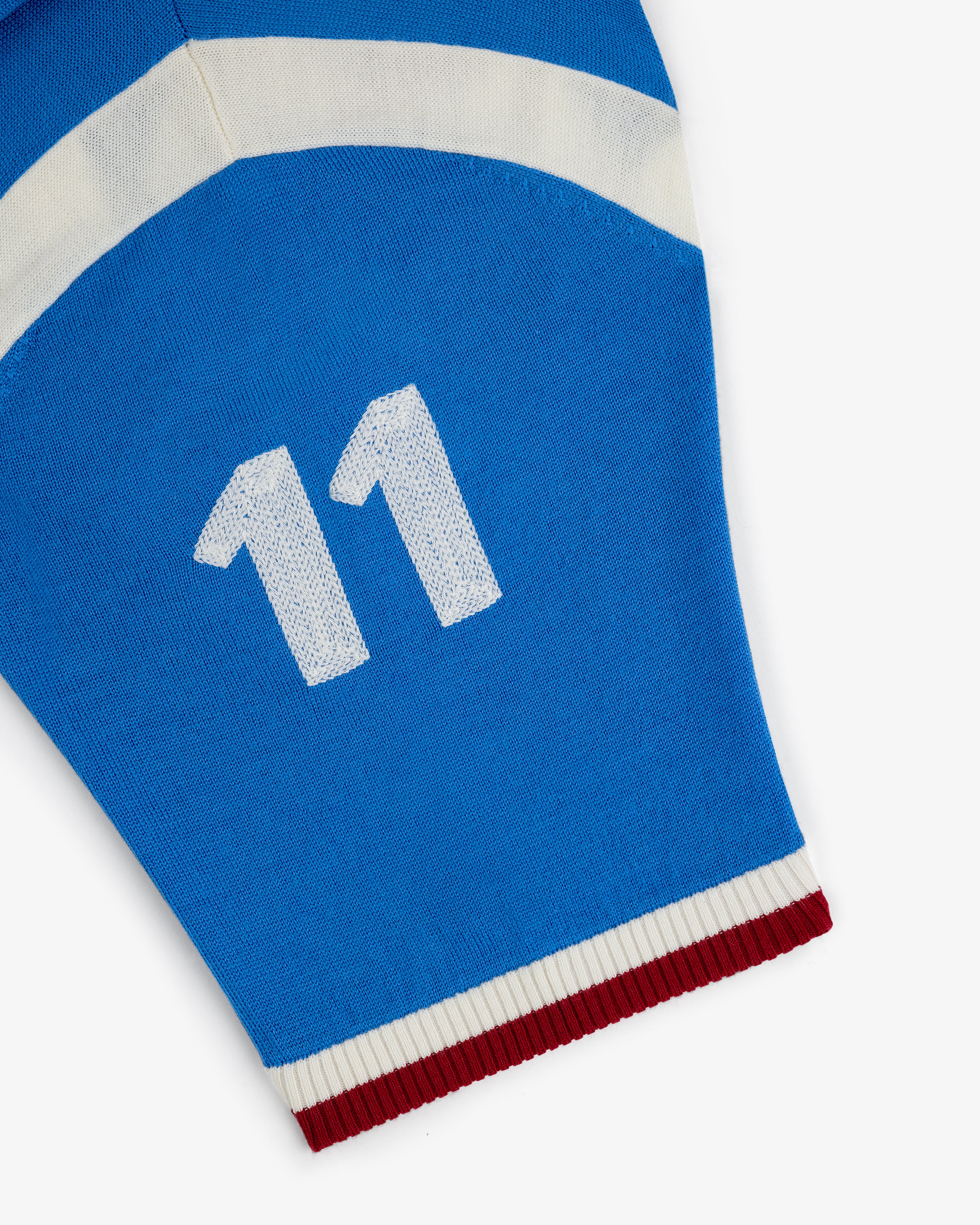 Blue Merino Wool Cycling Jersey with white number 11, a white stripe, and red and white trim.
