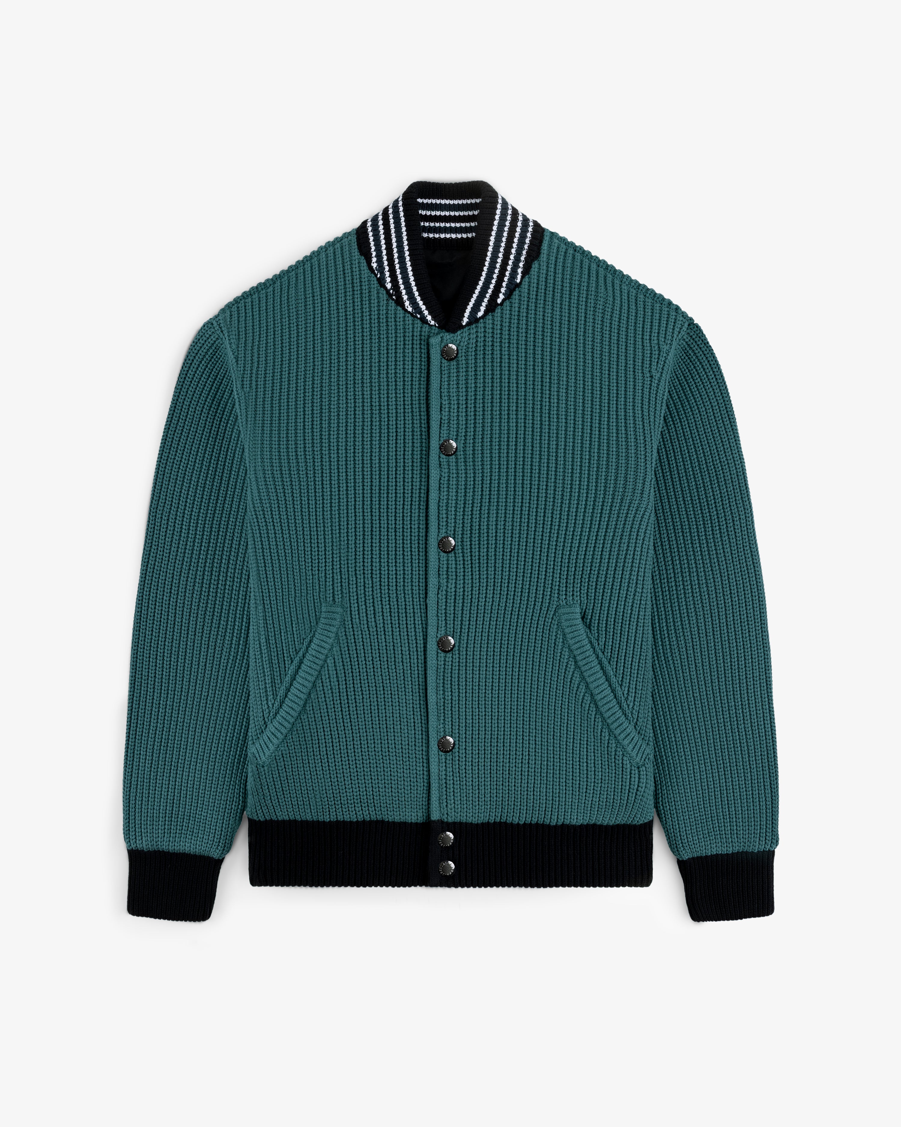 Reversible Knit Bomber Jacket in teal ribbed knit with black and white striped collar, black cuffs, and button front.