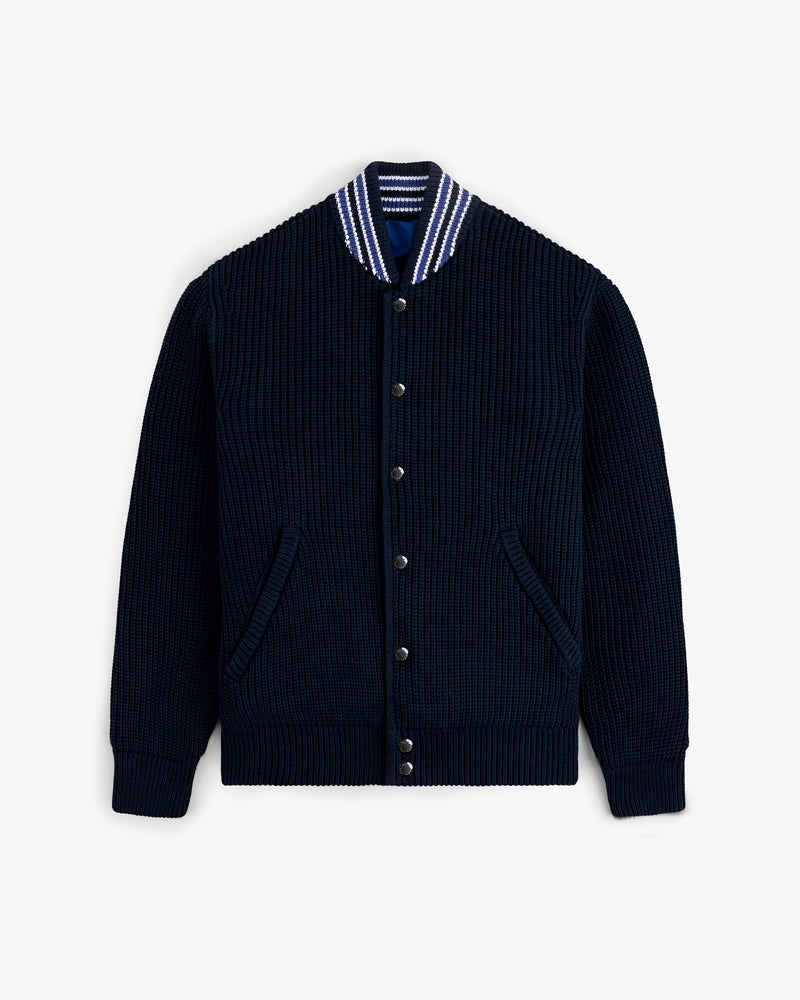 Reversible Knit Bomber Jacket in navy blue with striped collar, button front, and two pockets displayed on white background.