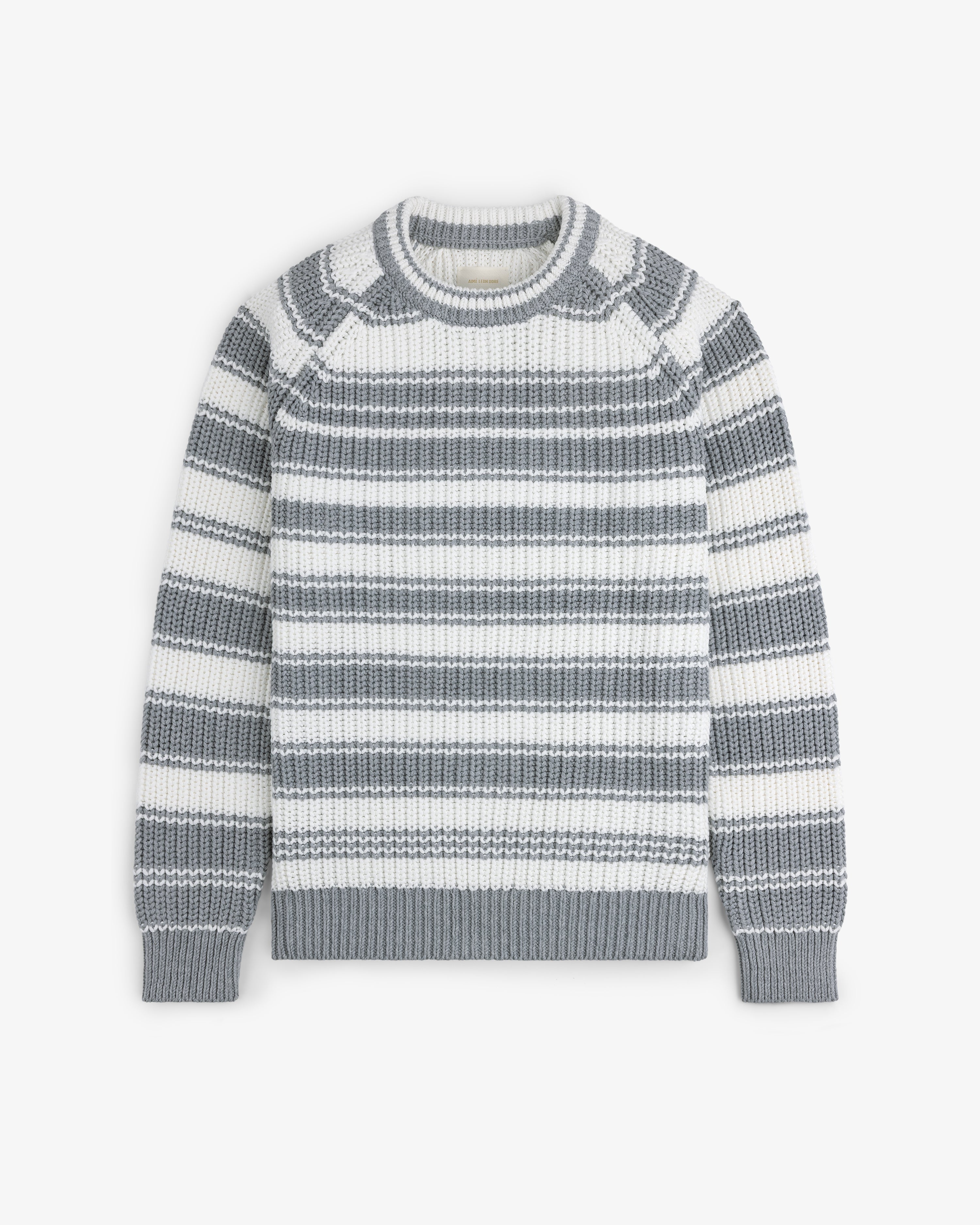 Striped Crewneck Sweater in gray and white with long sleeves and ribbed cuffs, hem, and neckline laid flat.