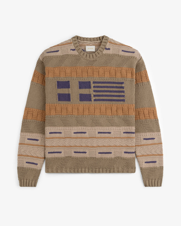 Simaía Crewneck Sweater in beige and brown with blue, orange, and tan geometric patterns, shown flat on white.