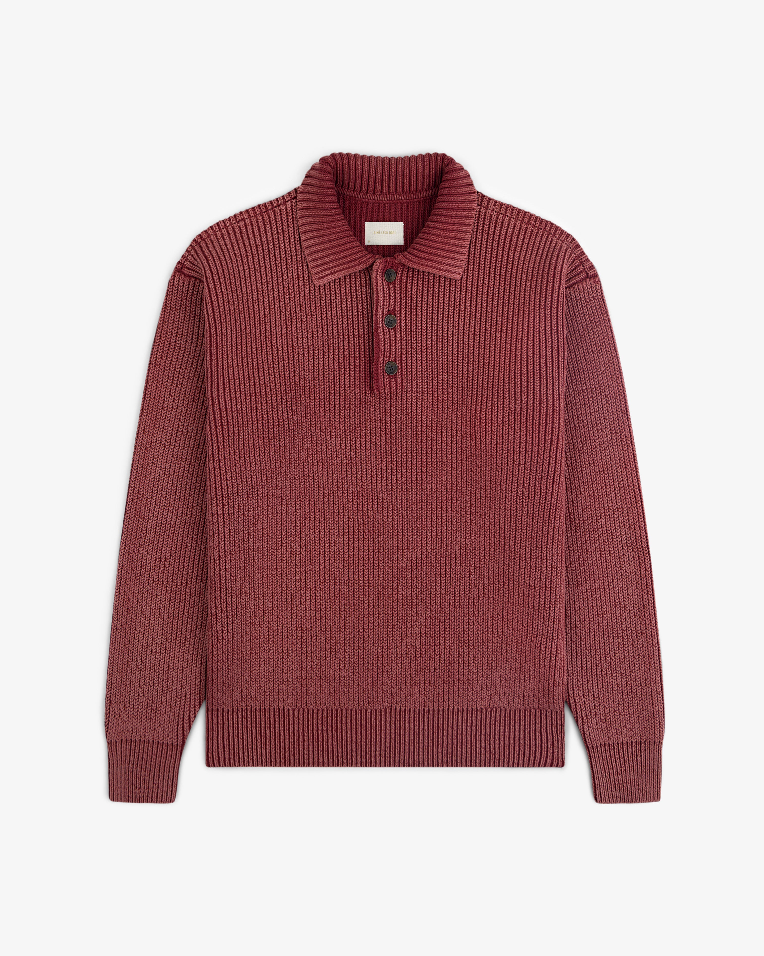 Stone Washed Knit Polo in maroon with ribbed long sleeves, collar, and three buttons, shown laid flat on white.