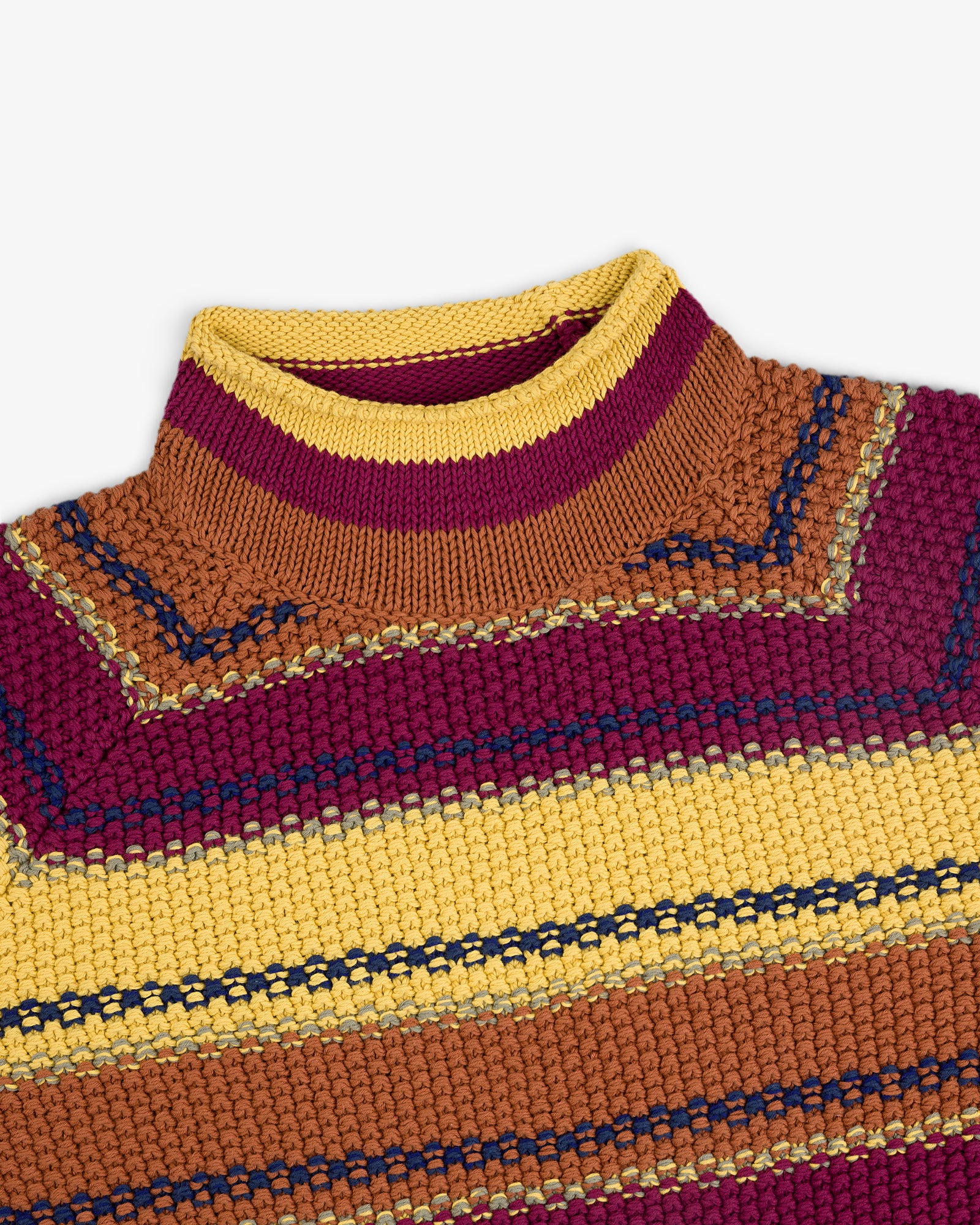 Close-up of the Striped Rollneck Sweater in yellow, brown, maroon, and blue horizontal stripes with a ribbed collar.