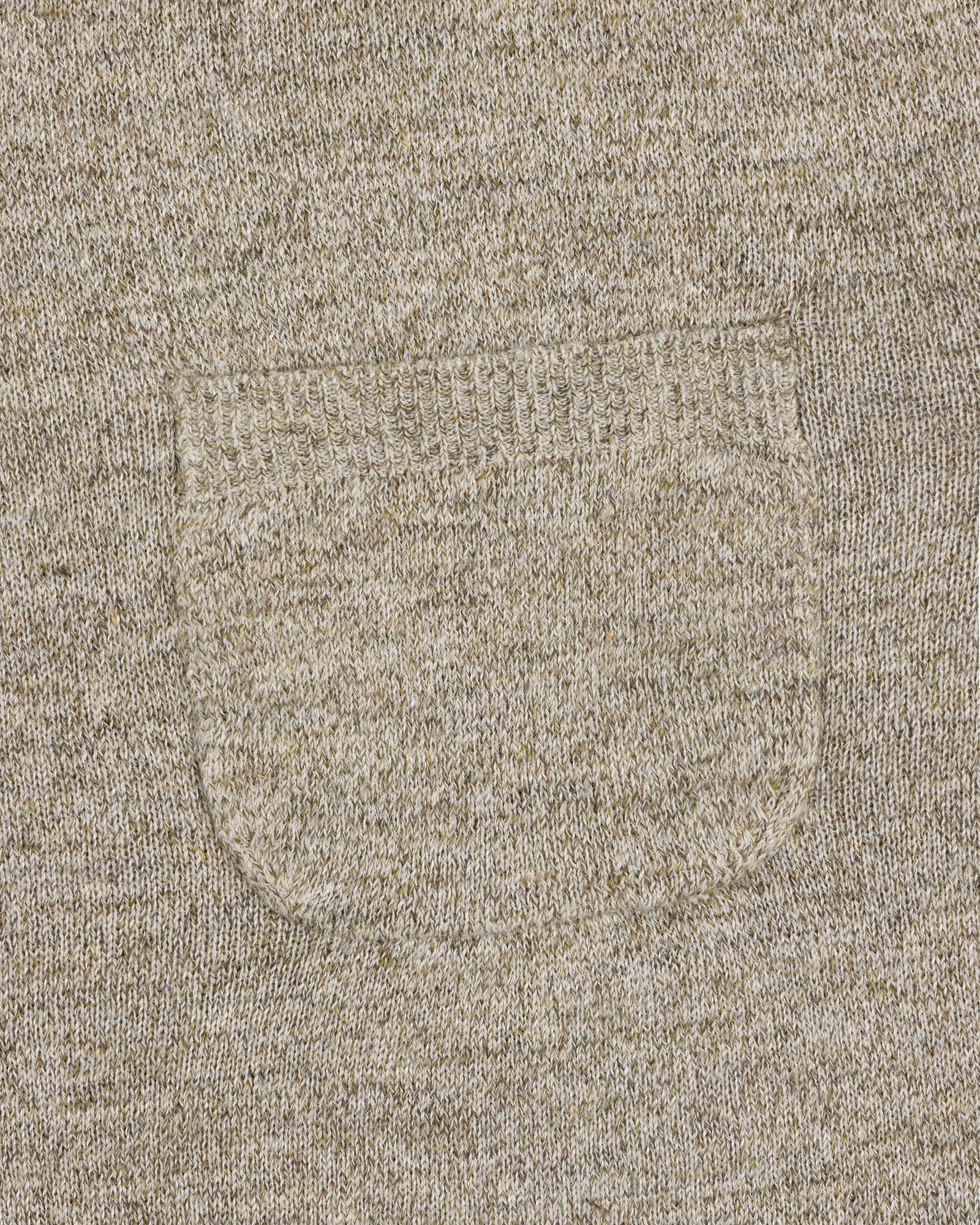 Close-up of the Long-Sleeve Knit Pocket Tee in beige, featuring a small textured patch pocket on the front.