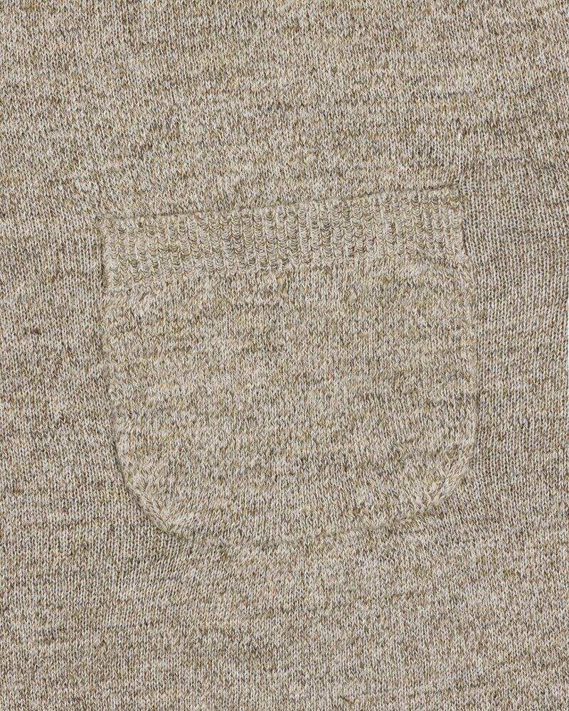 Close-up of the Long-Sleeve Knit Pocket Tee in beige, featuring a small textured patch pocket on the front.
