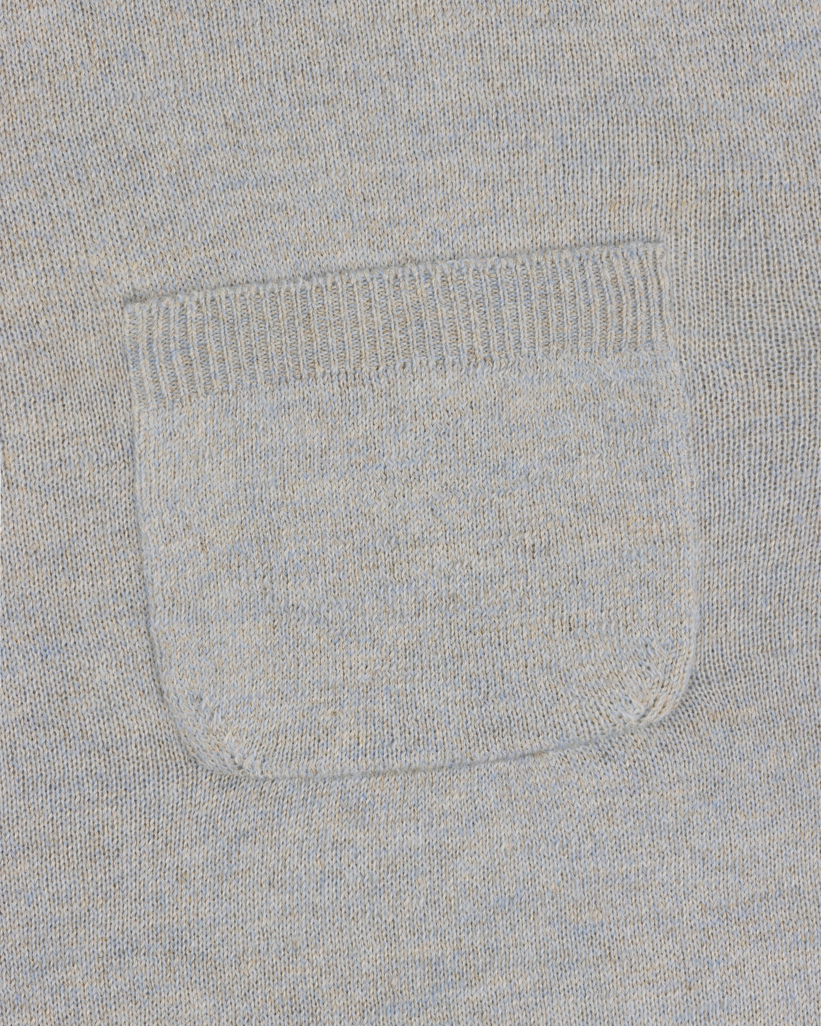 Close-up of the Long-Sleeve Knit Pocket Tee in light gray, featuring a small rectangular patch pocket.