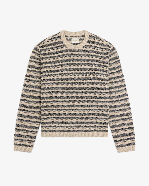 Bouclé Open Knit Crewneck Sweater in beige and navy stripes with long sleeves, laid flat on a white background.