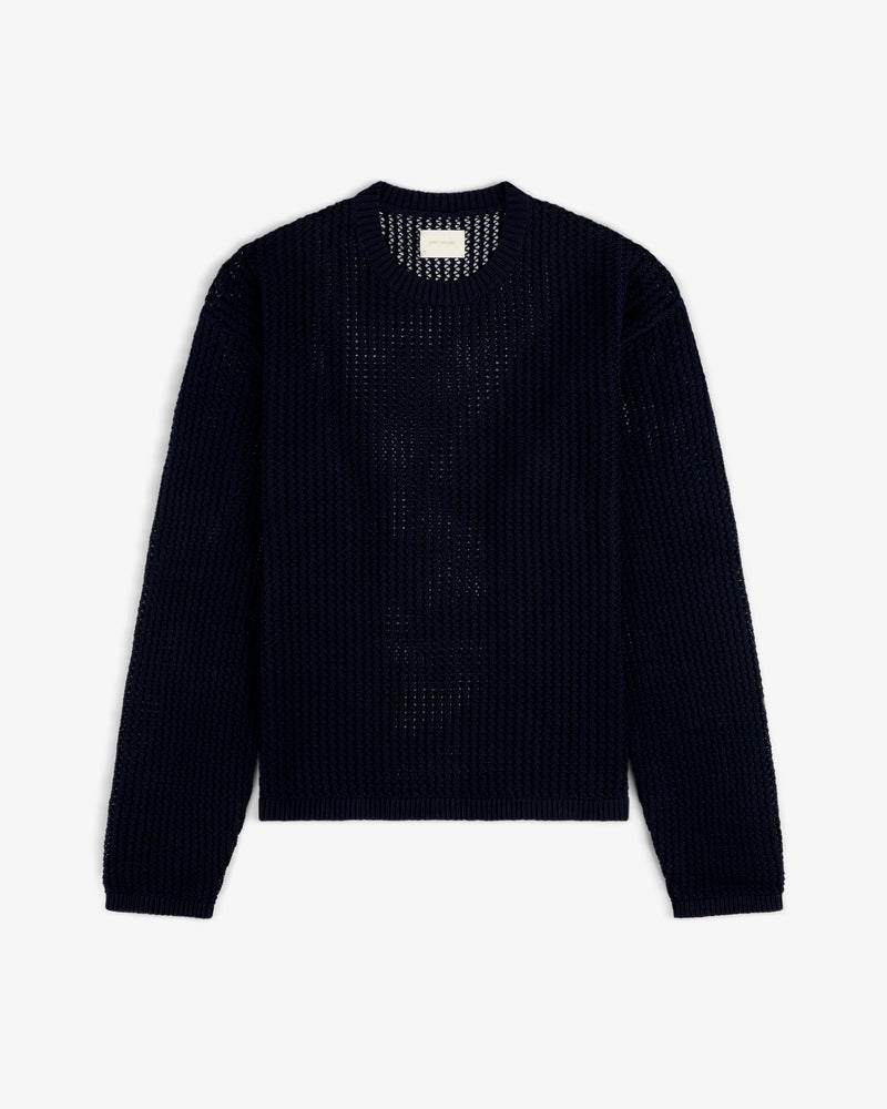 Navy Cotton Eyelet Crewneck Sweater with long sleeves, laid flat on a white background.