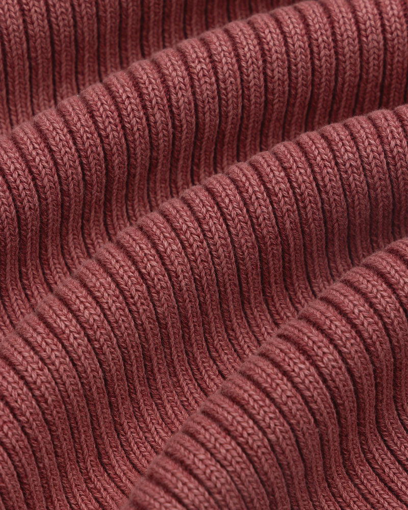 Close-up of ribbed, reddish-brown Stone Washed Knit Tank Top fabric with repeating raised and recessed textures.
