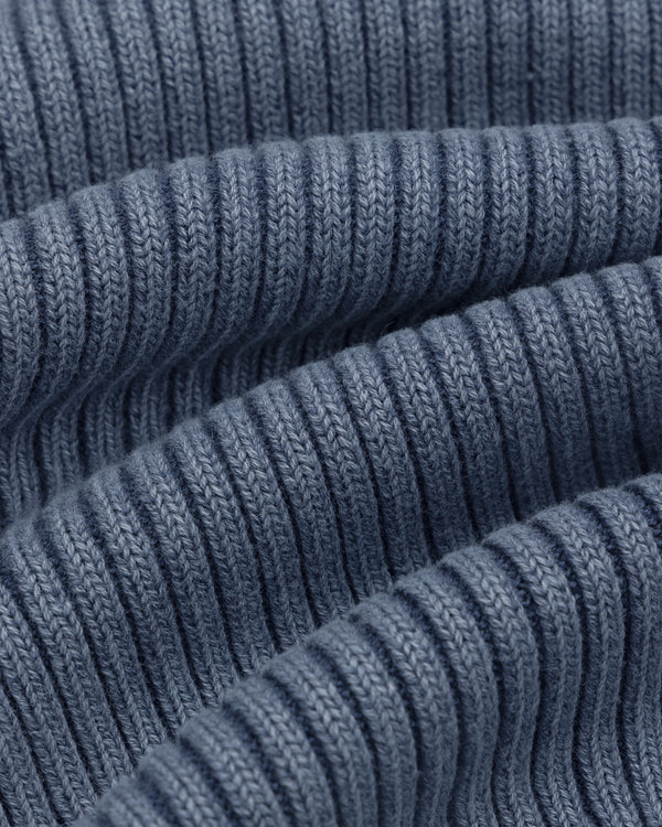 Close-up of the Stone Washed Knit Tank Top in blue, showcasing its soft, ribbed knit texture.
