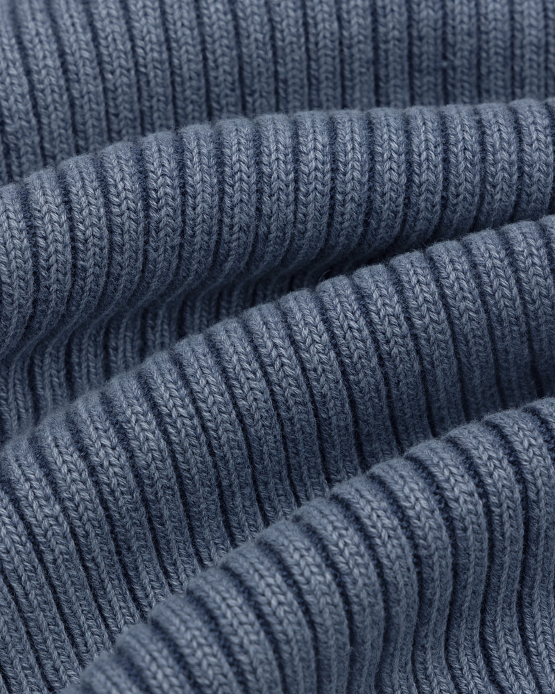 Close-up of the Stone Washed Knit Tank Top in blue, showcasing its soft, ribbed knit texture.