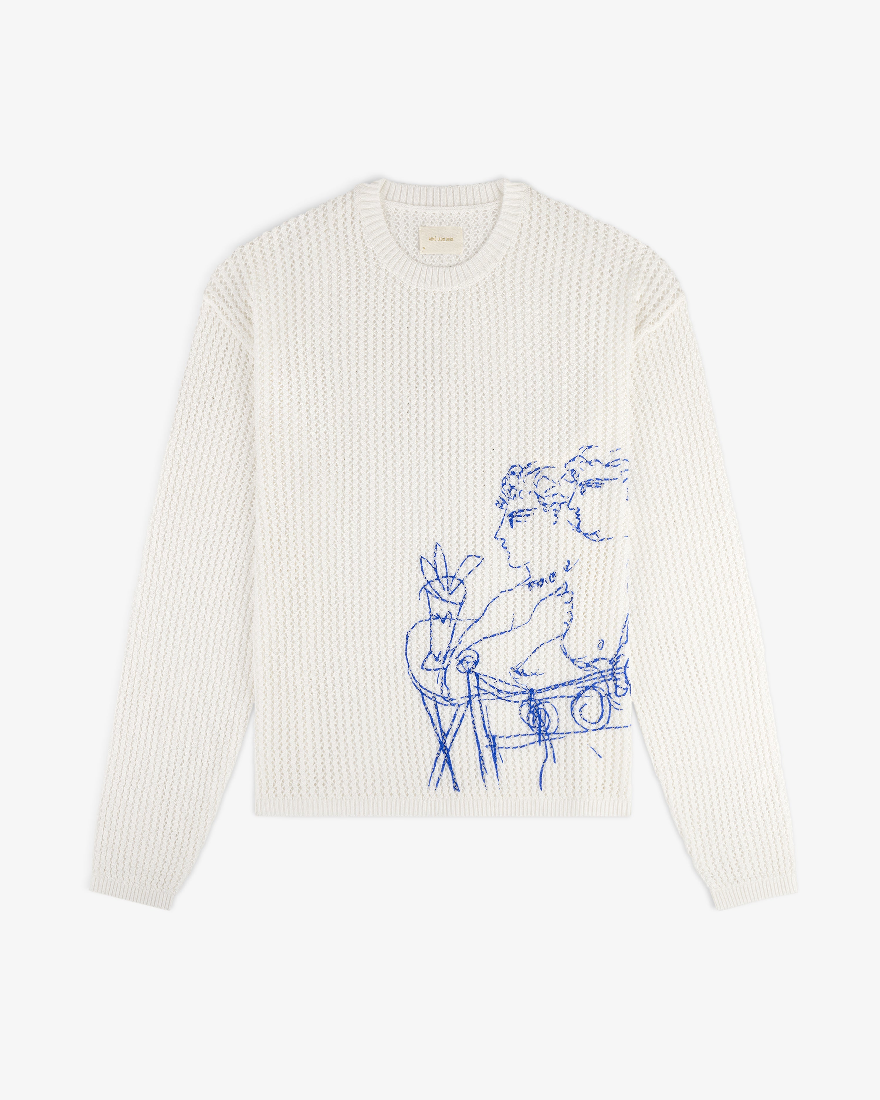 Fassianos "Rendez-Vous" crewneck sweater features blue line art of two figures and a plant on white knit.