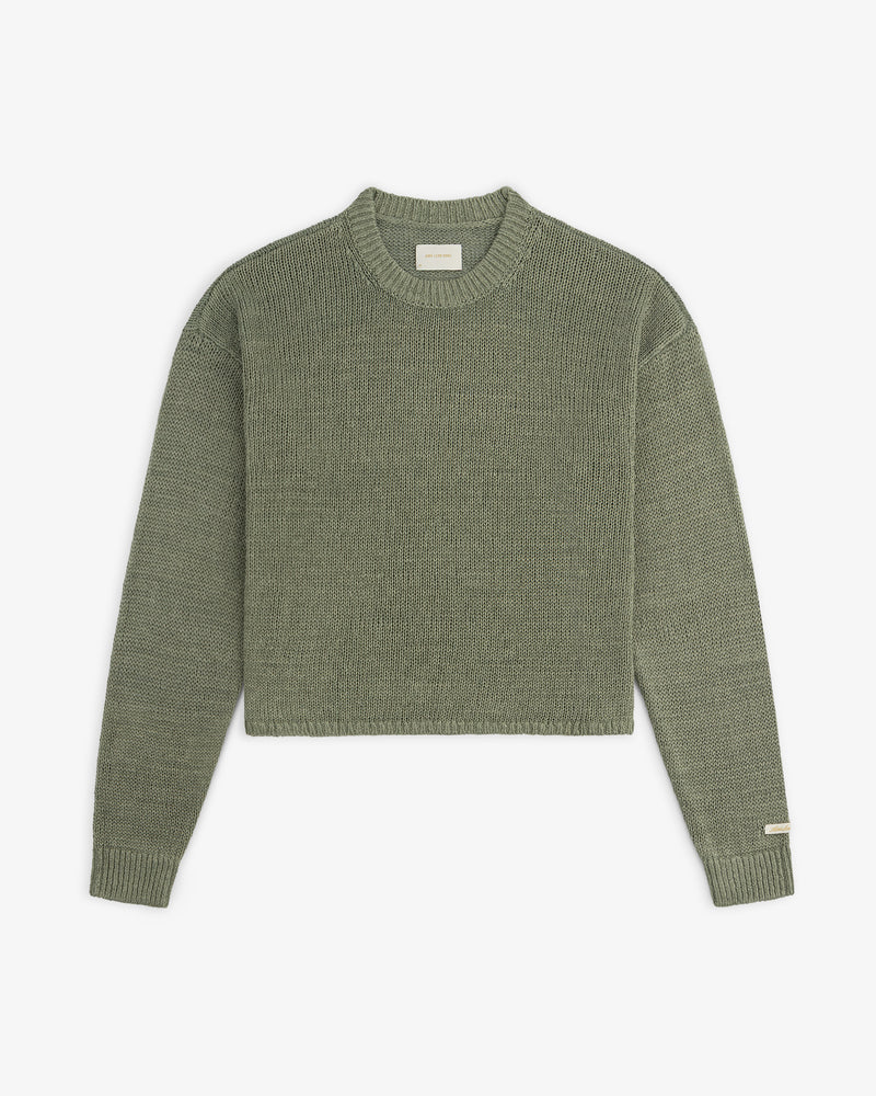 Olive green Linen Knit Crewneck Sweater with long sleeves, ribbed cuffs and hem, and a small left sleeve label.