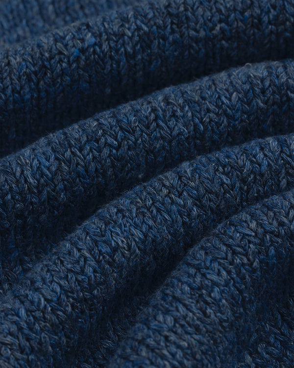 Close-up of Linen Knit Drawstring Short in blue, showing textured stitches and gentle fabric folds.