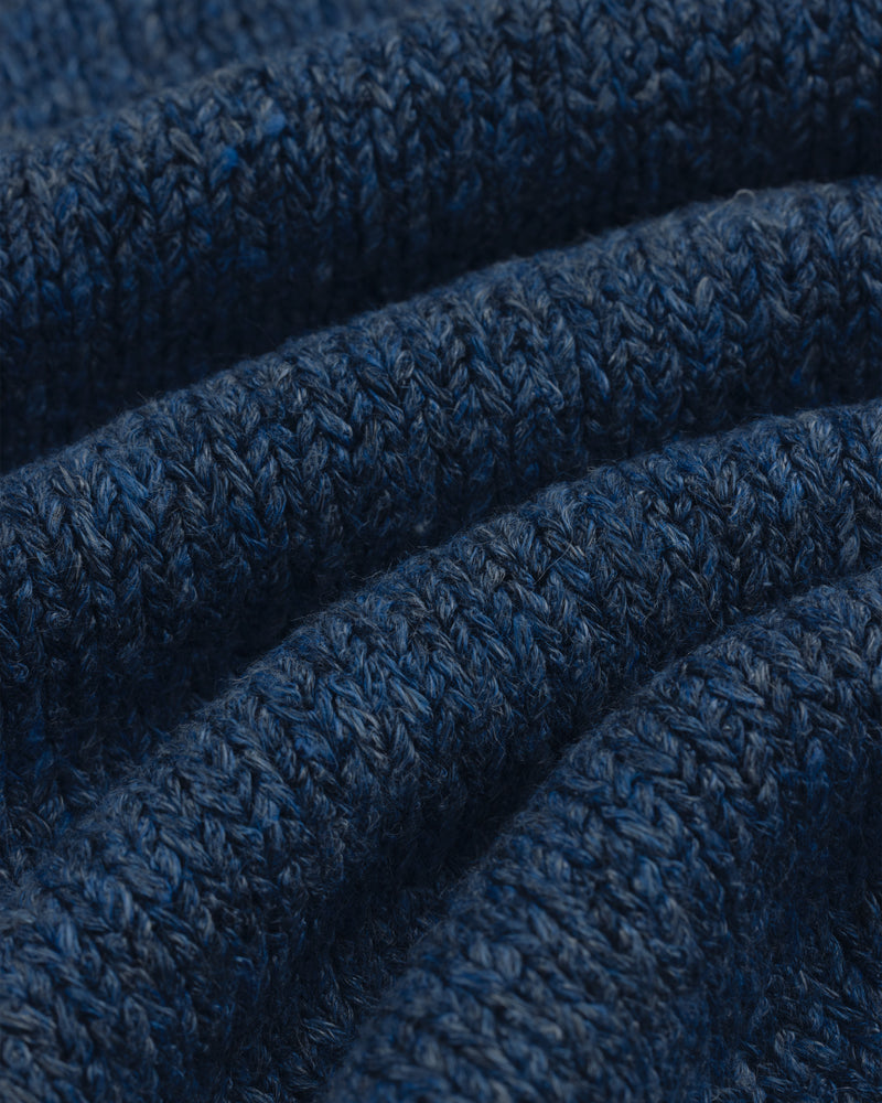 Close-up of Linen Knit Drawstring Short in blue, showing textured stitches and gentle fabric folds.