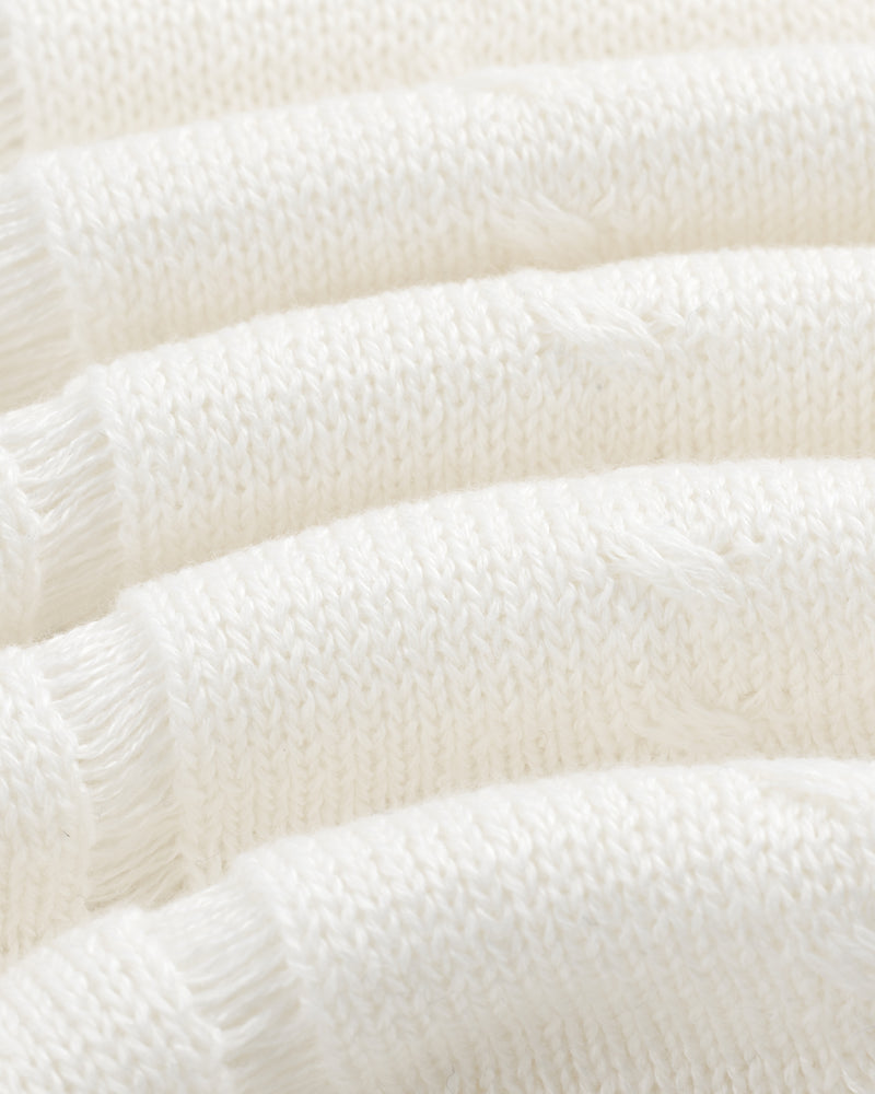 Close-up of folded, white Pointelle Tank Top with visible knit texture and horizontal lines.