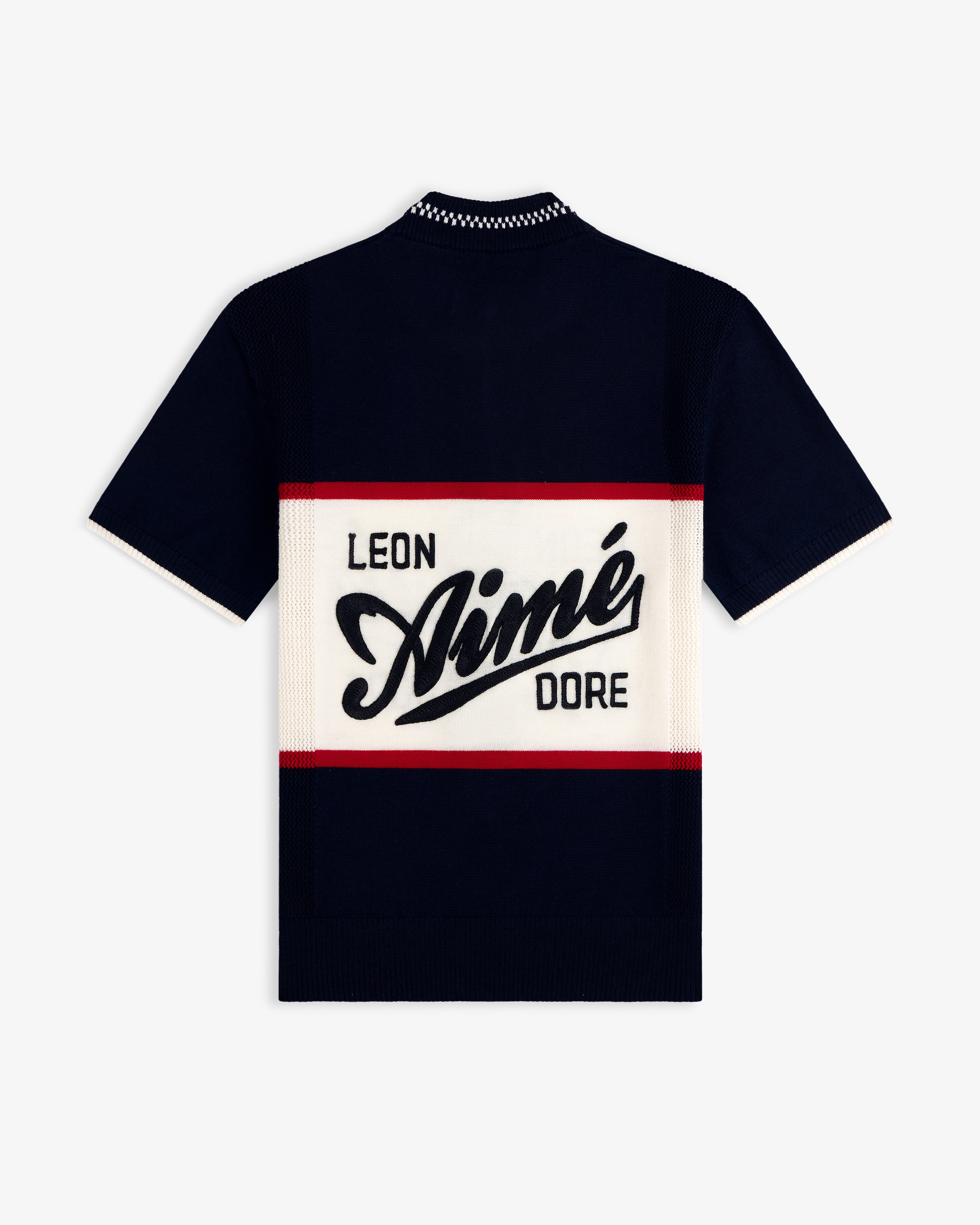 Navy Merino Wool Cycling Jersey with bold LEON Aimé DORE text on a cream panel, bordered by red stripes.