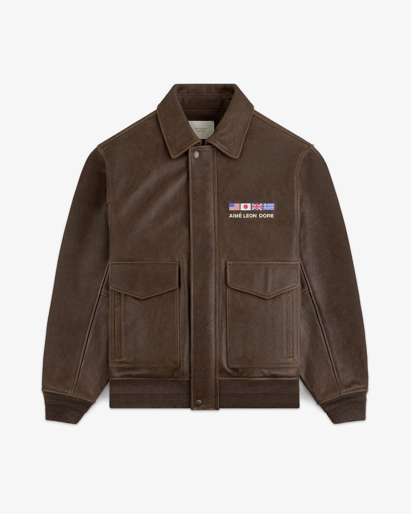 World's Borough Leather Flight Jacket in brown with two large front pockets and small AIME LEON DORE flag embroidery.