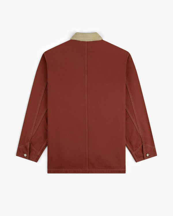 Back view of the Denim Barn Jacket in rust with a beige collar and buttoned cuffs, laid flat on a white background.