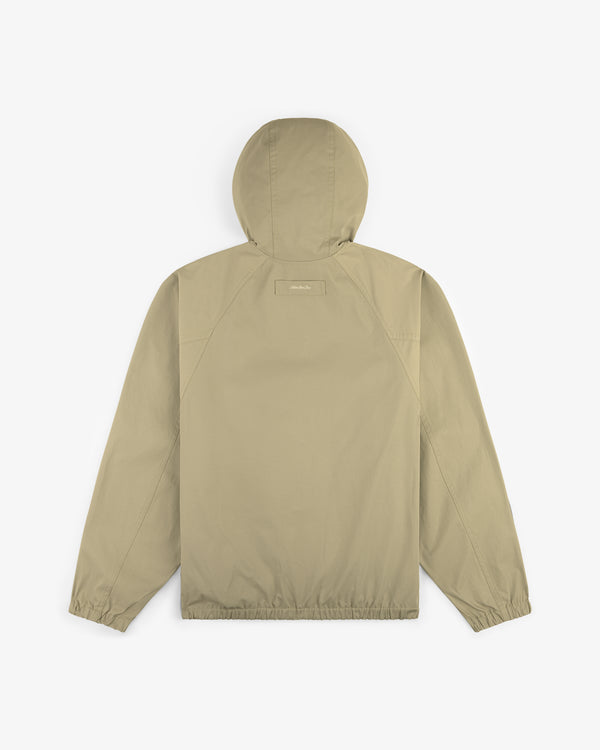 Reversible Madras Windbreaker in beige with long sleeves, elastic cuffs, and straight hem, shown from the back.