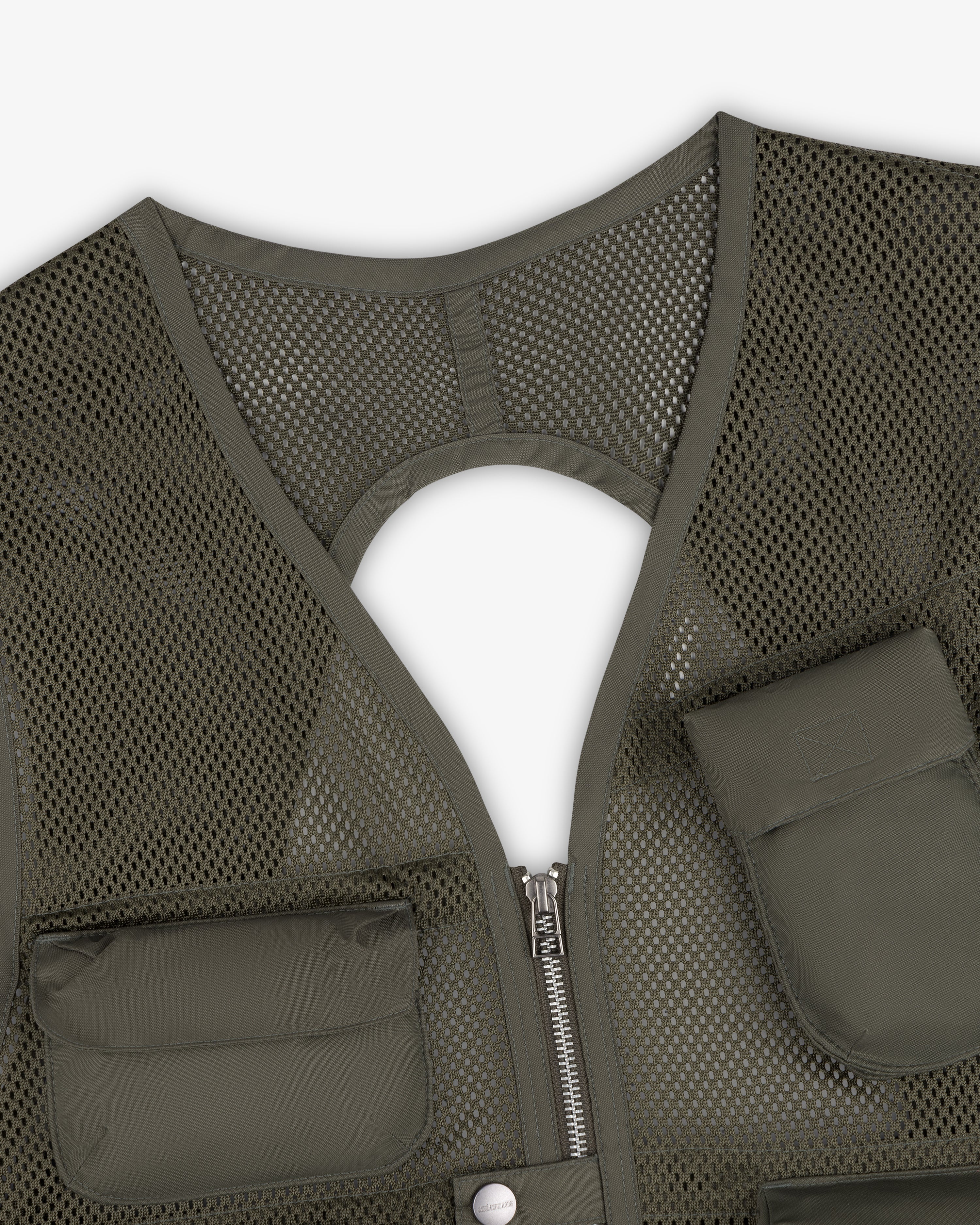 Close-up of the Nylon Utility Vest in olive green mesh with zipper and two front pockets on a white background.