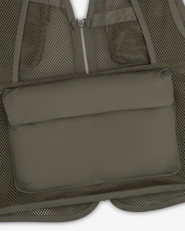Close-up of the Nylon Utility Vest in olive green mesh with a zippered front and large padded pocket.