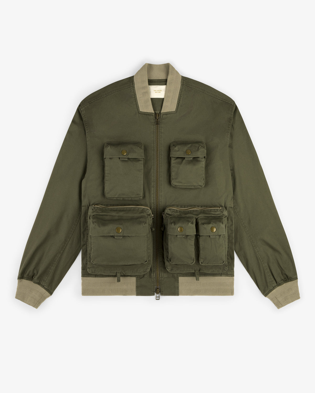 Safari Utility Bomber in olive green with four front flap pockets and beige ribbed cuffs, collar, and hem.