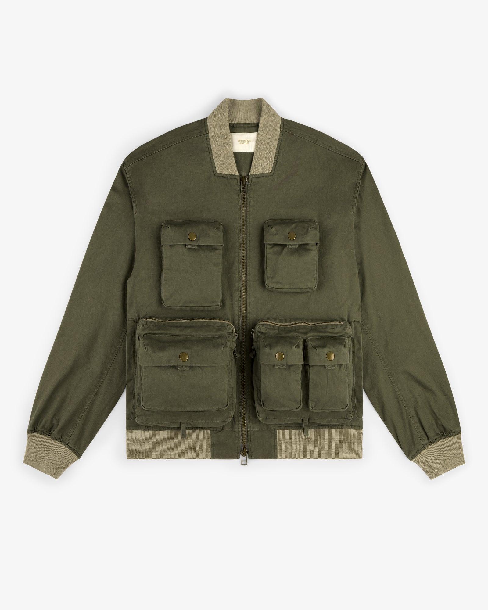 Safari Utility Bomber in olive green with four front flap pockets and beige ribbed cuffs, collar, and hem.
