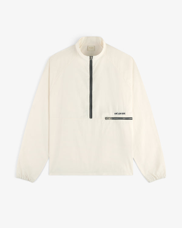 Off-white Nylon Packable Windbreaker with black half-zip, zip chest pocket, and AIMÉ LEON DORE text.
