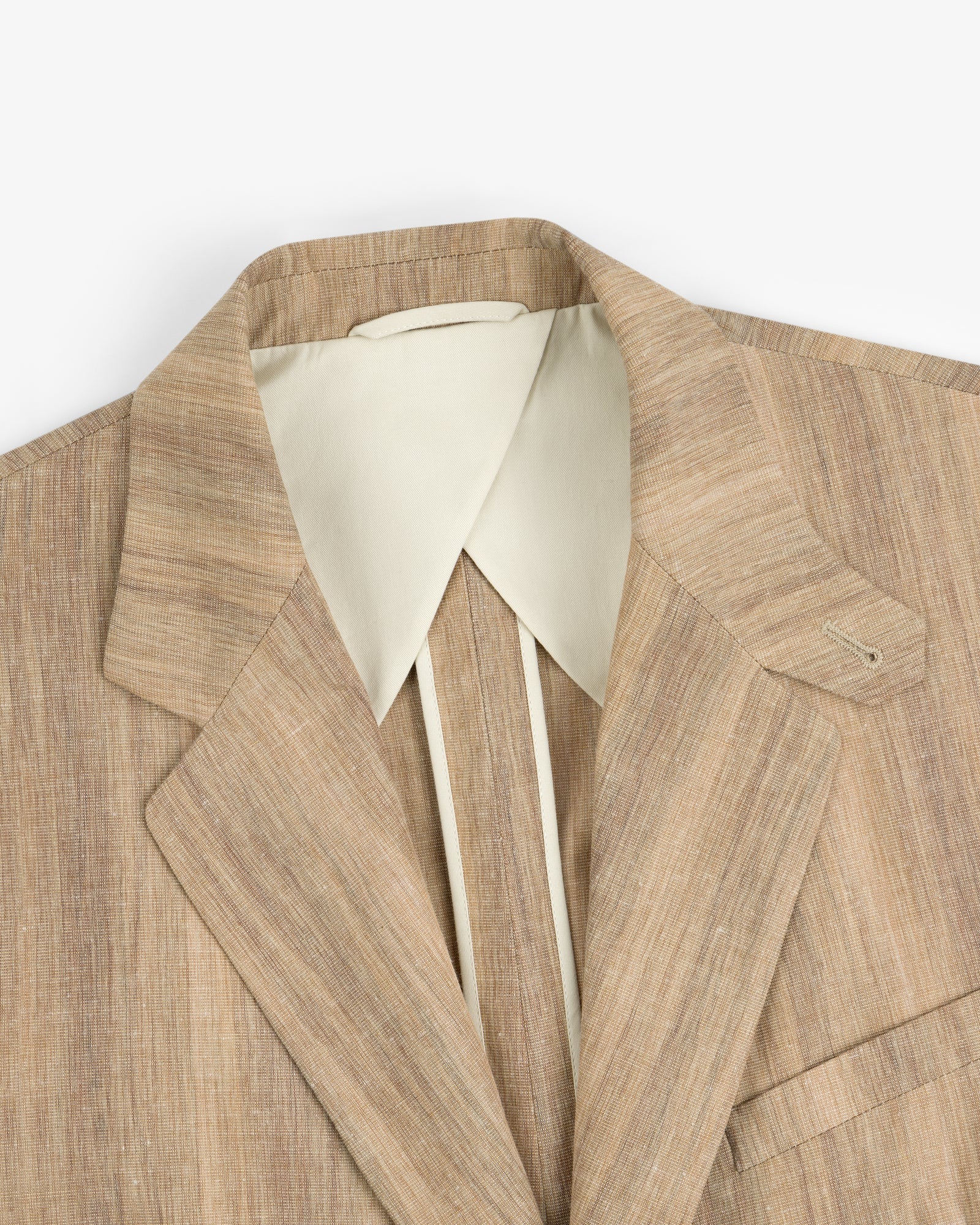 Single-Breasted Safari Suit Jacket in light brown linen, paired with a cream wide-collar shirt, shown from shoulders up.