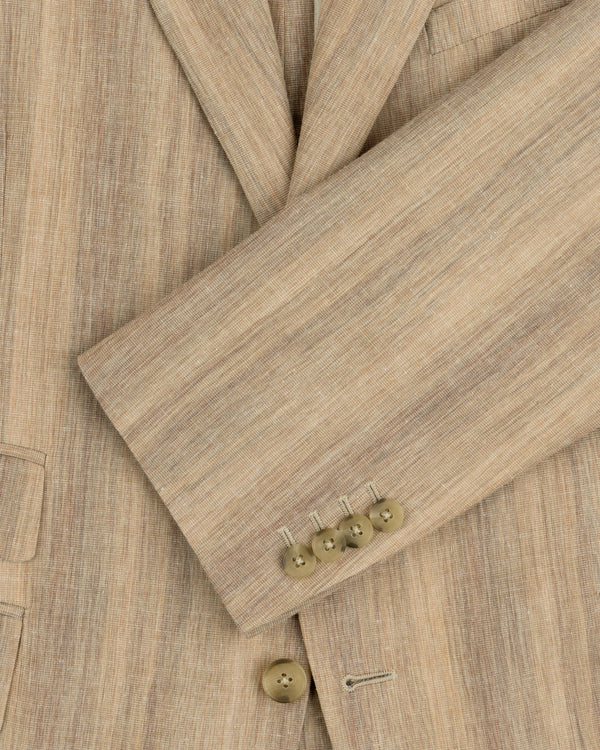 Close-up of a Single-Breasted Safari Suit Jacket sleeve in beige linen with four tan buttons and a visible pocket.