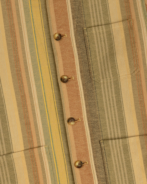 Close-up of the Blanket Striped Chore Jacket, featuring brown buttons and a visible chest pocket.