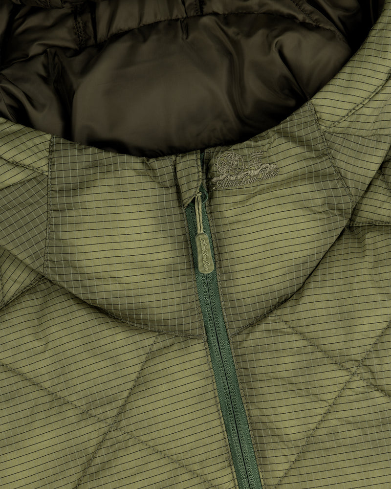 Close-up of the Nylon Quilted Unisphere Jacket in olive green with a zipper and subtle grid pattern.