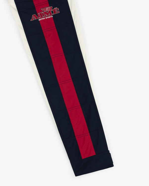 Nylon Moto Jacket in navy with a red vertical stripe, ATMS MOTOR SPORTS logo at hip, and white side panel.