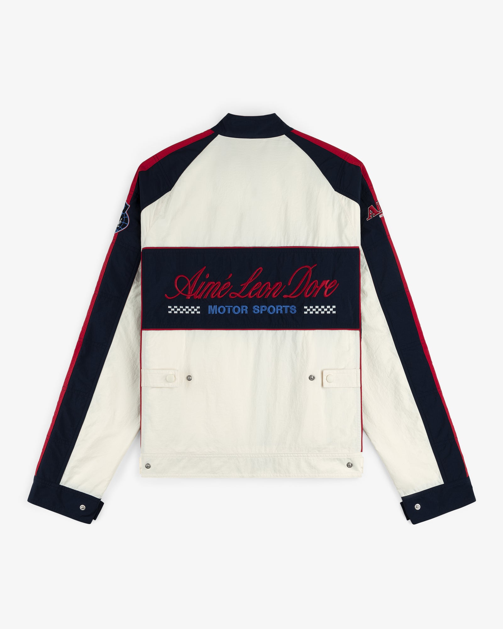 Back view of the Nylon Moto Jacket in cream and navy with red accents, Aimé Leon Dore Motor Sports on the back.