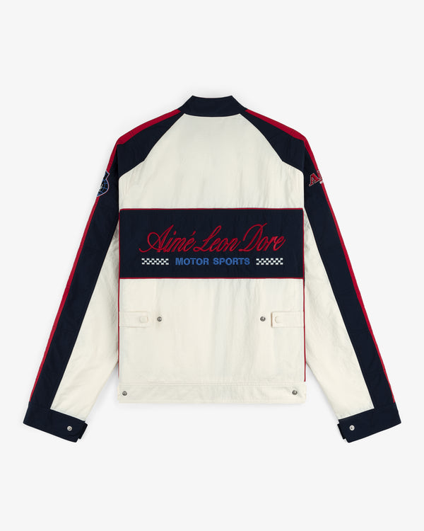 Back view of the Nylon Moto Jacket in cream and navy with red accents, Aimé Leon Dore Motor Sports on the back.