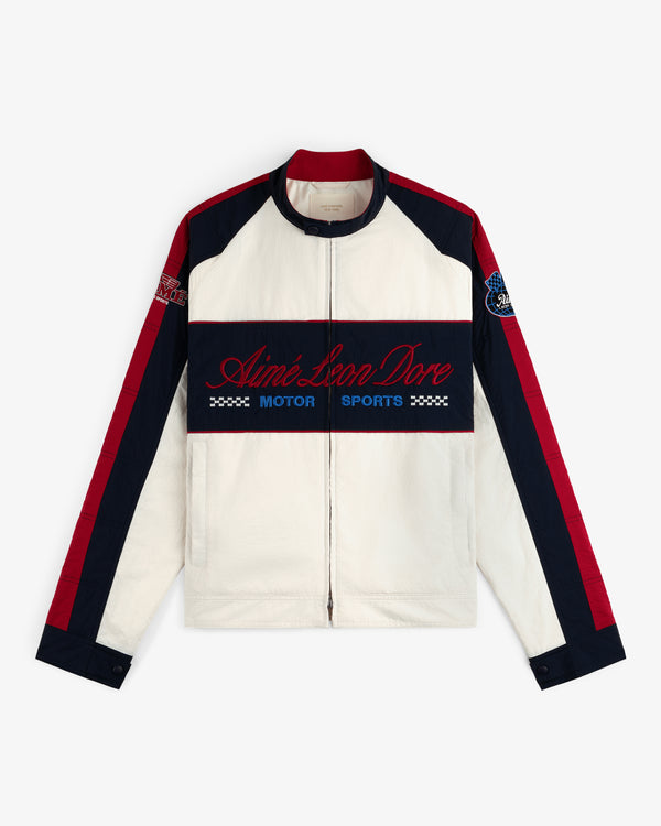 A cream, red, and navy Nylon Moto Jacket with Aimé Leon Dore Motor Sports embroidered on the front.