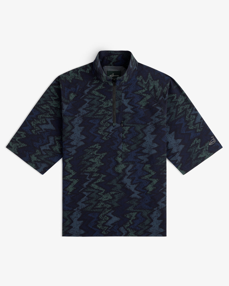 ALD Golf Nylon Quarter Zip Pullover with a dark zigzag pattern and stand collar, laid flat on a white background.