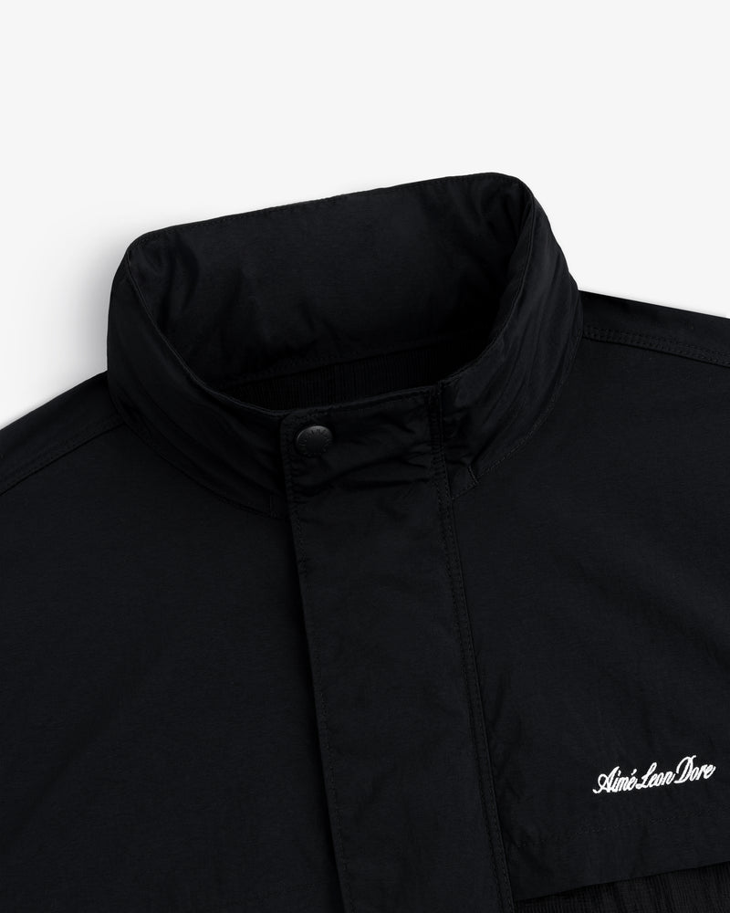 Nylon Track Jacket with high collar and snap button, “Aimé Leon Dore” embroidered in white on the chest.