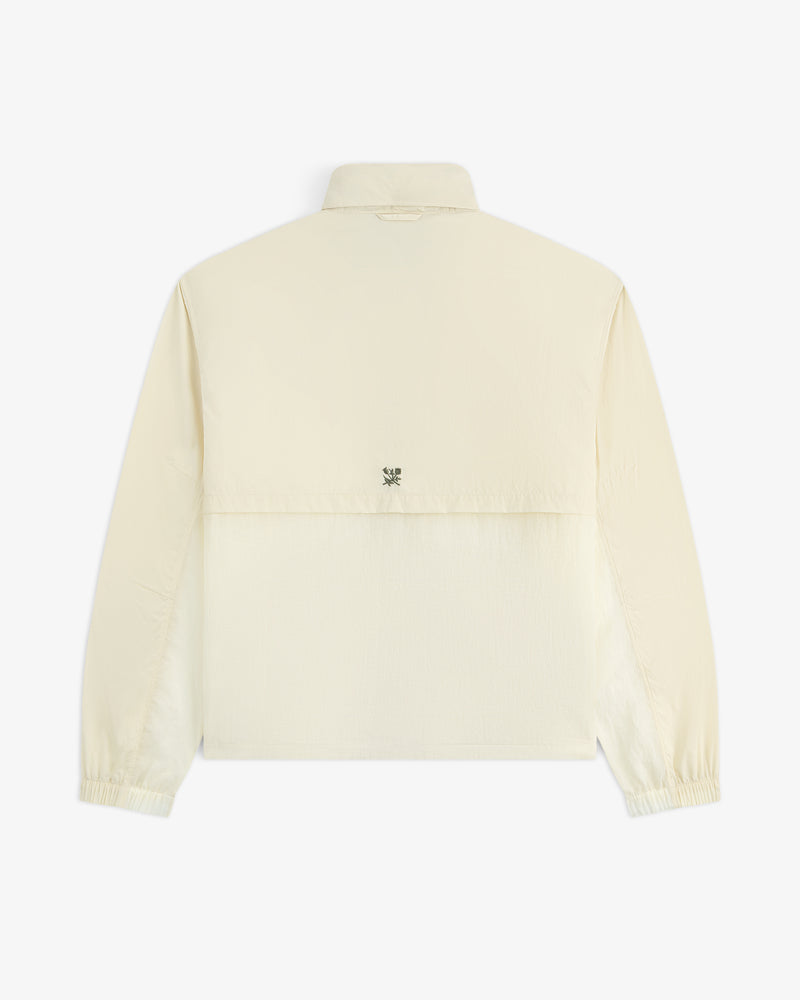 Back view of the Nylon Track Jacket in light beige with a collar, elastic cuffs, and a small logo at the upper center.