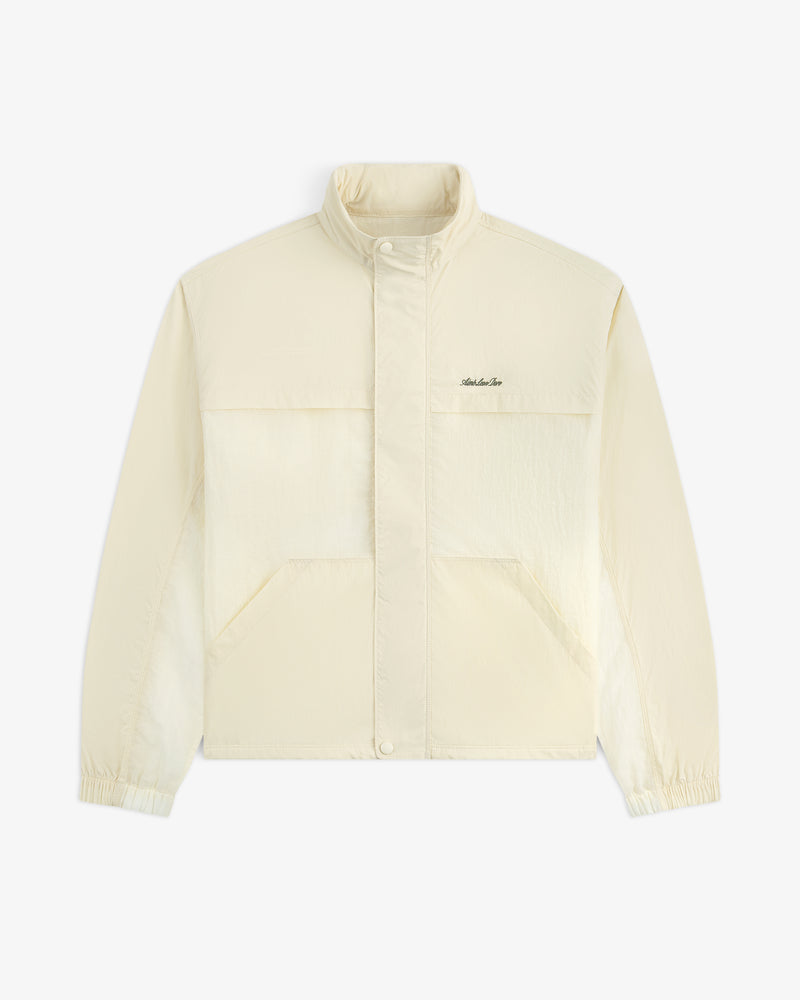 Cream-colored Nylon Track Jacket with snap buttons, two large pockets, and chest embroidery.