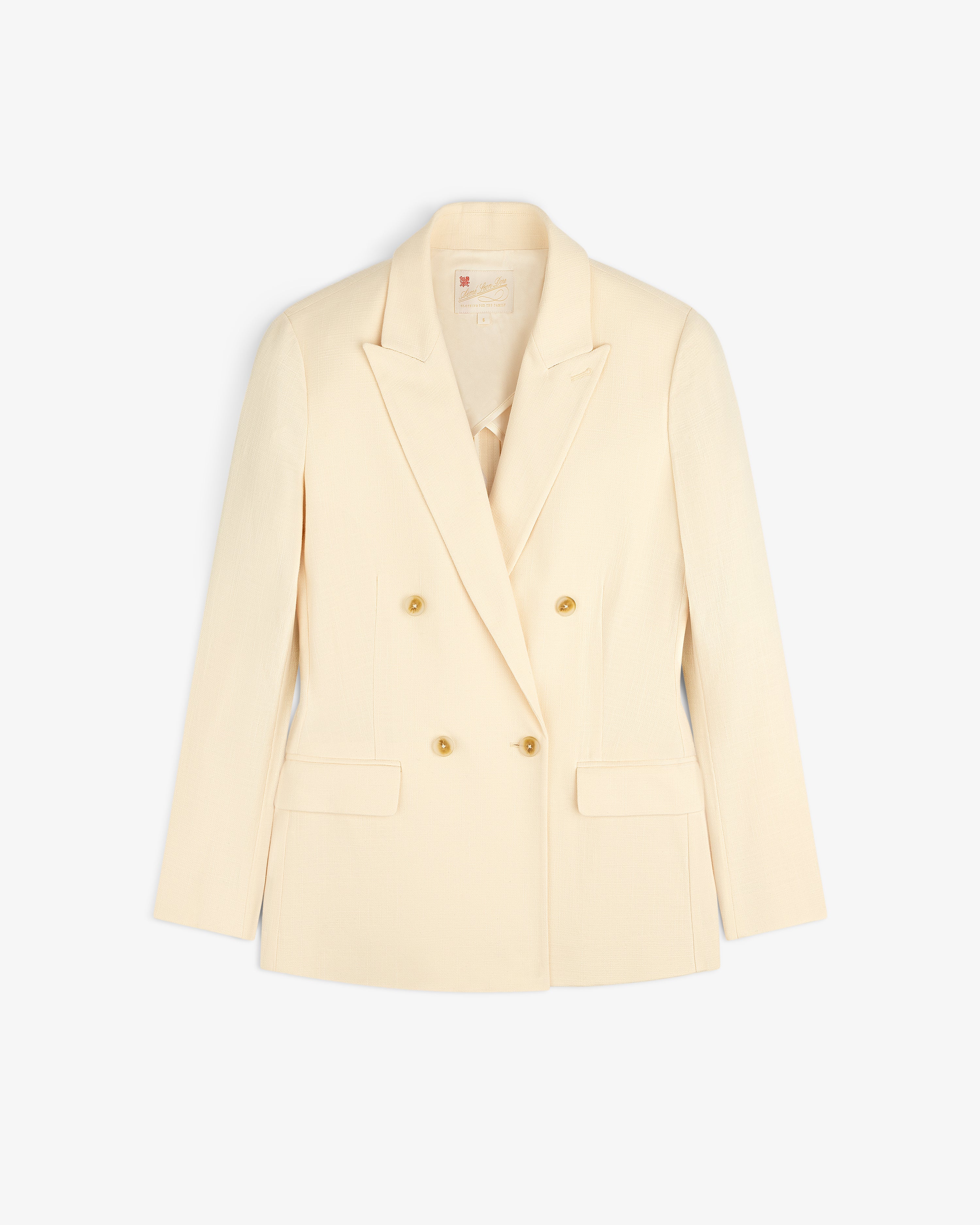 Double-Breasted Unconstructed Blazer in cream with notched lapels and gold buttons, shown on a white background.