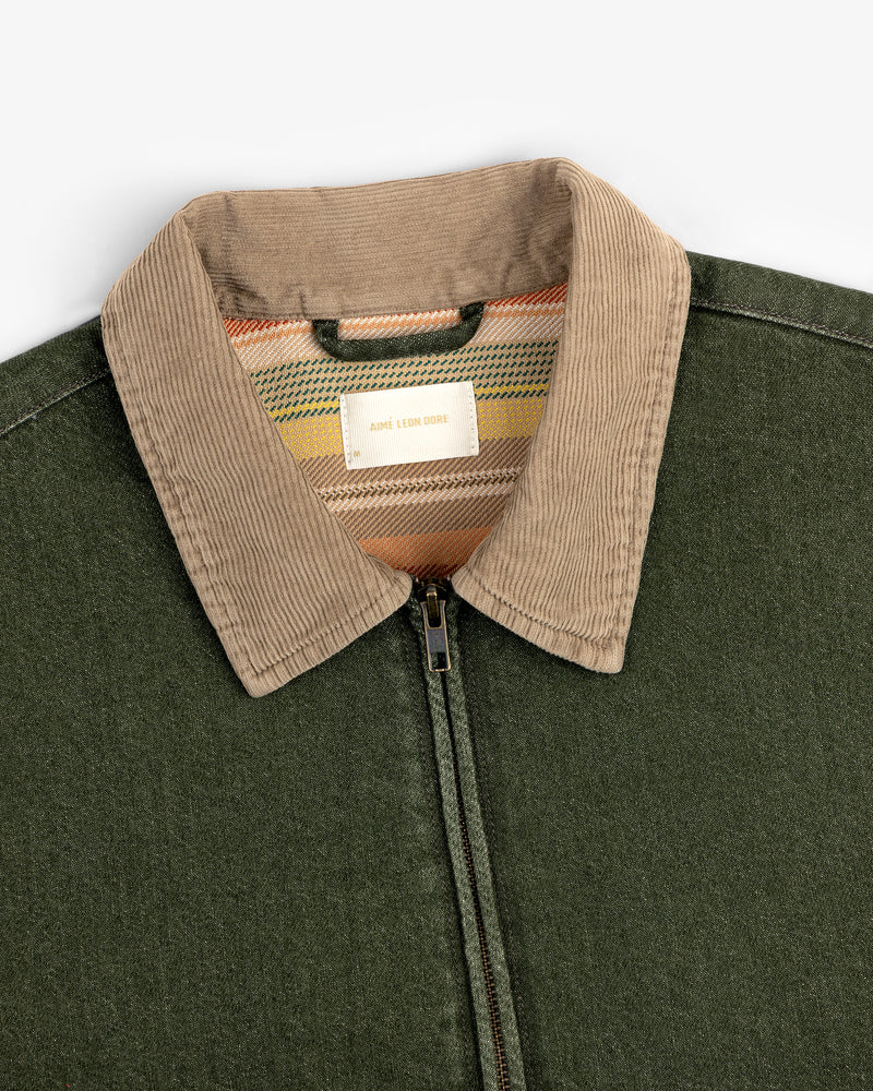 Denim Zip Jacket with tan corduroy collar and striped inner label, displayed on a white background.