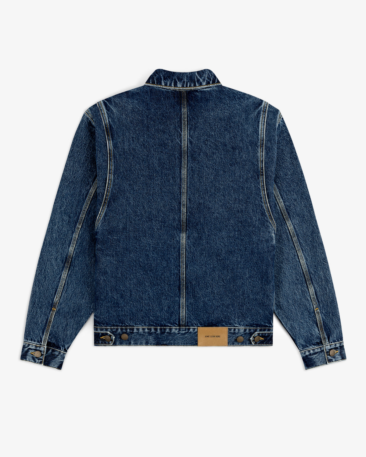 Back view of the Denim Trucker Jacket in blue with tan stitching and a brown leather patch at the hem.