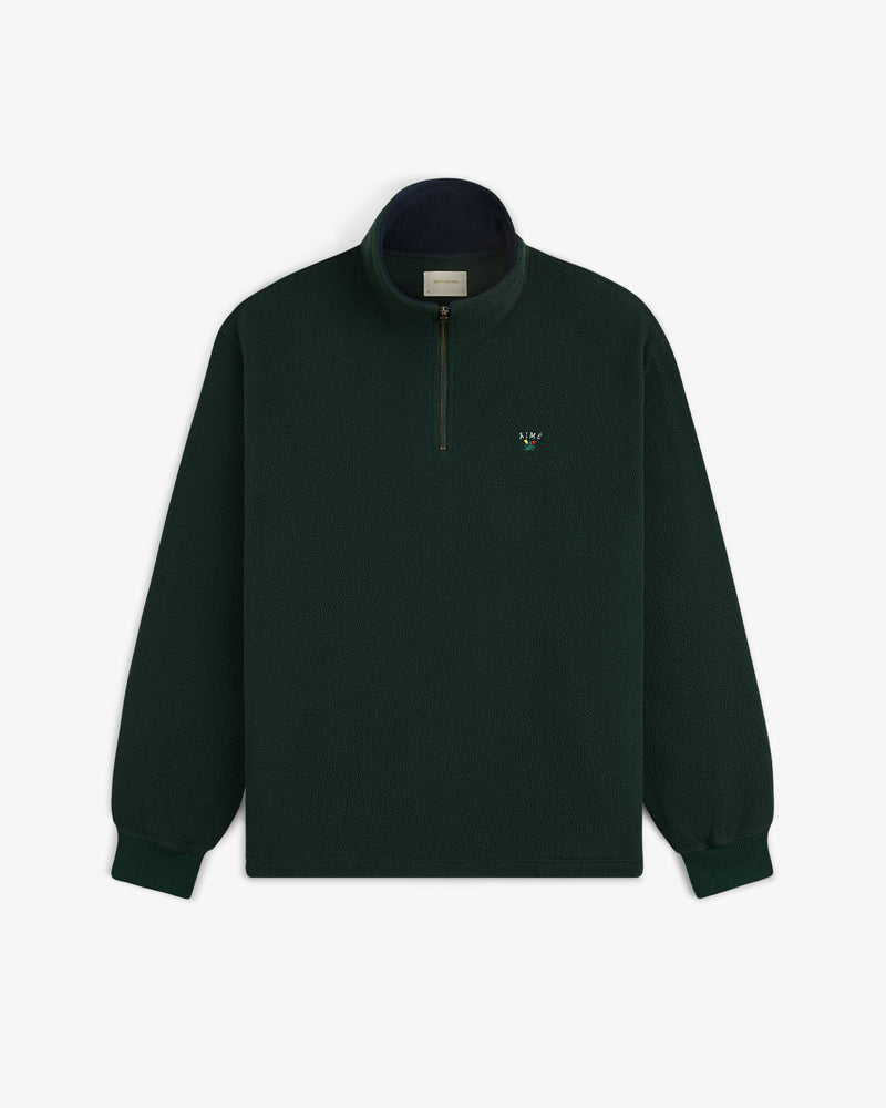 Crest Quarter-Zip Fleece Pullover in dark green with long sleeves and a small logo embroidered on the left chest.