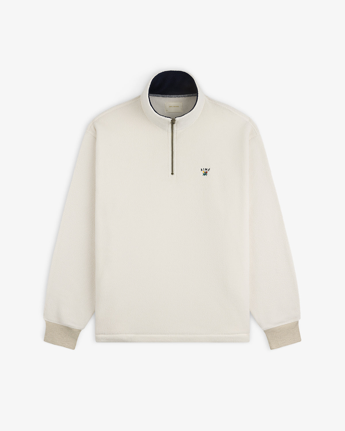 Cream Crest Quarter-Zip Fleece Pullover with small embroidered logo on chest and beige cuffs.